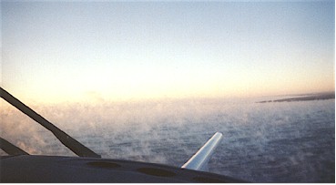 Aerial photo of deepening transient lake-effect clouds and 