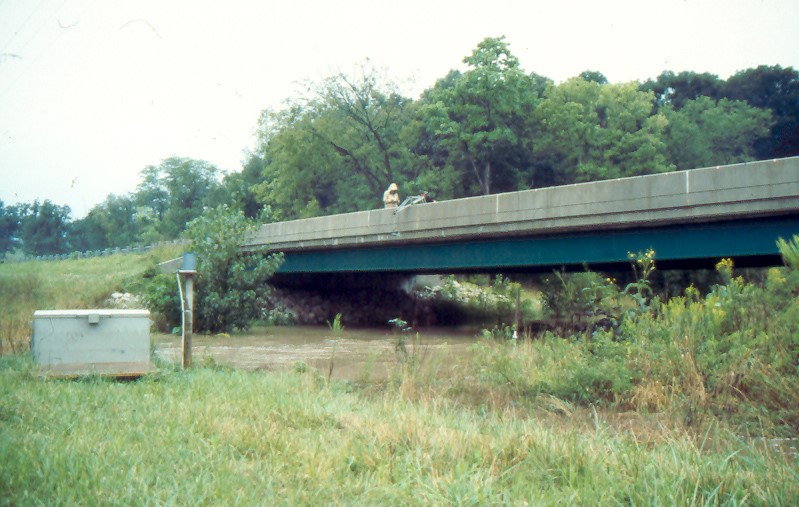Illinois State Water Survey Field Research Specialist Measuring Discharge during 1993 Flood Event. 9-2-1993